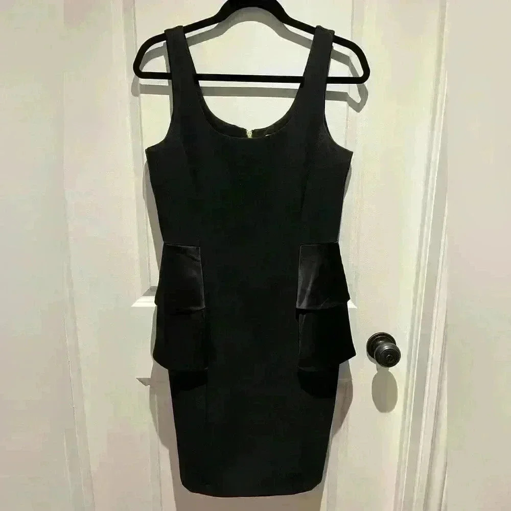 Michael  Kors black peplum dress size 4 Medium